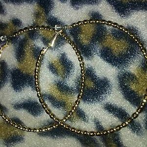 Goldtone 2.5" twisted hoop earrings